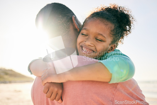 Image of Beach, kid and happy black family hug, embrace and bond on outdoor vacation for peace, freedom and quality time. Sunshine flare, nature love and African youth child, father or people smile in Nigeria