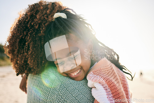 Image of Beach, child and happy black family hug, embrace and bond on outdoor vacation for peace, freedom and quality time. Sunshine flare, nature love and African kid, mother or people smile in South Africa