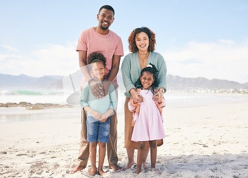 Image of Happy portrait, nature and black family on beach holiday for peace, freedom and outdoor quality time together. Love, ocean sea sand or Jamaica children, father and mother smile with vacation sunshine