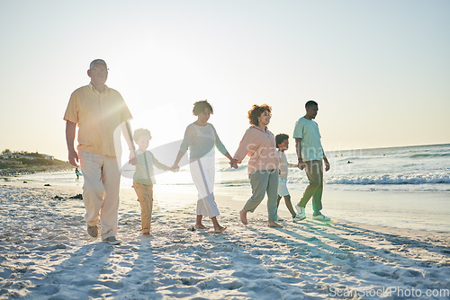 Image of Family, grandparents and children at beach, holding hands and jump with swing, happiness or bonding on holiday. Parents, kids and senior people for love, vacation or summer sunshine in morning by sea