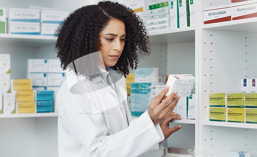 Image of Pharmacy, medicine and retail with woman in store for healthcare, drug dispensary and treatment prescription. Medical, pills and shopping with pharmacist for check, label information or product