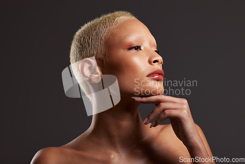 Image of Beauty, makeup and profile of black woman in dark studio with platinum hair isolated on grey background. Art aesthetic, cosmetics and face of beautiful African model with luxury spa facial skin care.