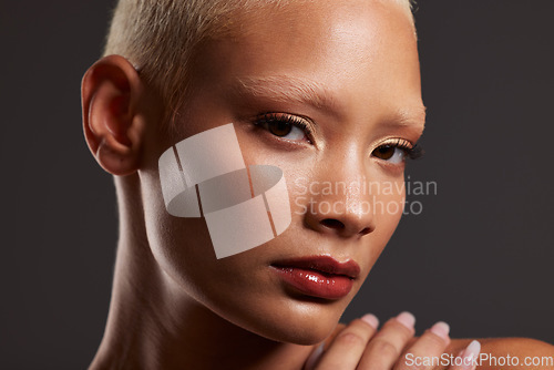 Image of Skincare, makeup and zoom, face of woman in dark studio with serious expression isolated on grey background. Art aesthetic, cosmetics and portrait of model in skin care glow and luxury spa facial.