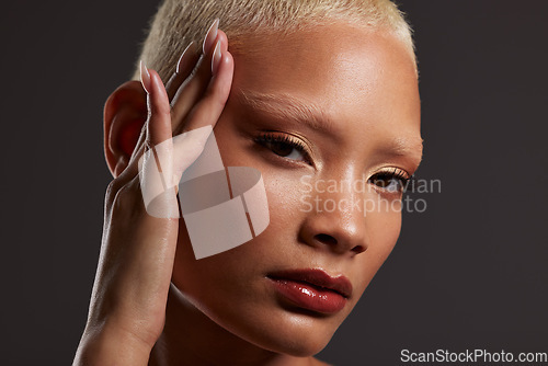 Image of Beauty, makeup and lipstick, portrait of black woman in dark studio with platinum hair isolated on grey background. Art aesthetic, cosmetics and African model with hand on face and luxury spa facial.
