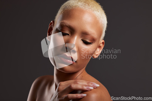 Image of Beauty, makeup and face of black woman with eyes closed in dark studio with platinum hair isolated on grey background. Art aesthetic, cosmetics and beautiful African model with glowing skin facial.