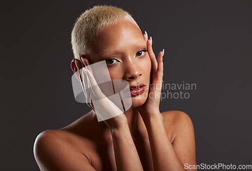 Image of Makeup, cosmetics and skincare, portrait of black woman in dark studio with platinum hair style isolated on grey background. Art, aesthetic and relax, African model in skin glow and luxury spa facial