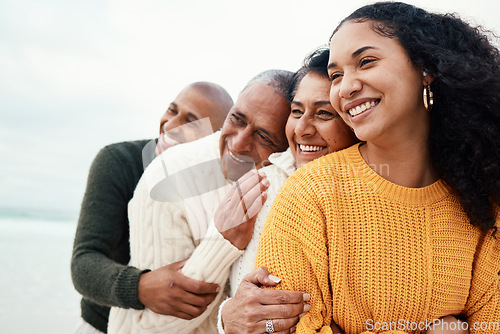 Image of Love, happy family and hug at a beach by siblings with mature parents on holiday, smile and bonding. Hugging, care and affection by senior couple on retirement vacation while embracing adult children