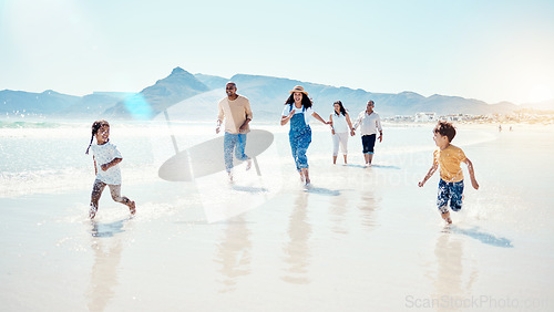 Image of Family, beach and parents play with children for bonding, quality time and adventure by sea. Travel, running and happy mother, father and kids with grandparents on summer holiday, vacation and relax