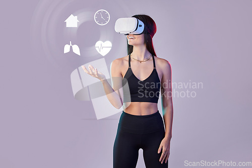 Image of Vr hologram, fitness or woman in metaverse on studio background with digital, health data for exercise. Virtual reality user or girl gamer in futuristic 3d ai experience to monitor heart wellness