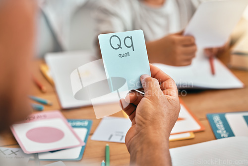 Image of Learning, cards and parents with children and letter lesson for language, study and alphabet. School, homework and help with family at table and teaching for reading tutor, literacy and phonics