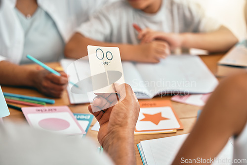 Image of Learning, cards and parents with children and alphabet lesson for language, study and letter. School, homework and help with family at table and teaching for reading tutor, literacy and phonics