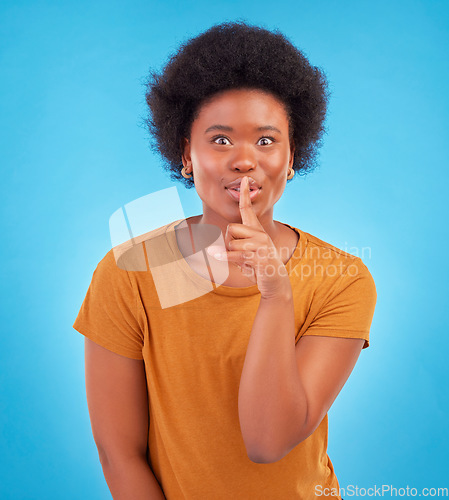 Image of Secret, portrait and black woman with finger on lips in studio, background and privacy of drama news. Excited model, silence and shush on mouth, quiet emoji or whisper gossip of confidential surprise