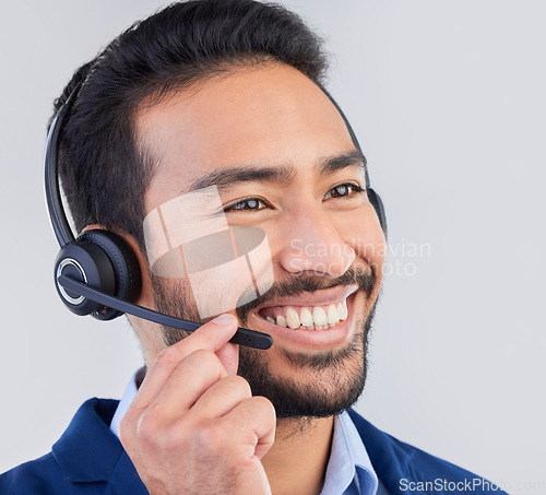 Image of Call center, microphone and face of man with smile for communication, consulting and crm network. Contact us, customer support mockup and happy male consultant in studio for help, service and sales