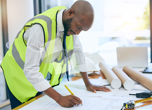 Image of Architect, blueprint and man writing in office on paper, design and planning building project. Construction, engineer and male project manager with plan for property, model or renovation strategy