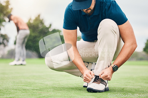 Image of Sports, tying and shoes of man on golf course for training, games and tournament match. Ready, start and tie laces with athlete playing in club on lawn field for relax, golfing and competition