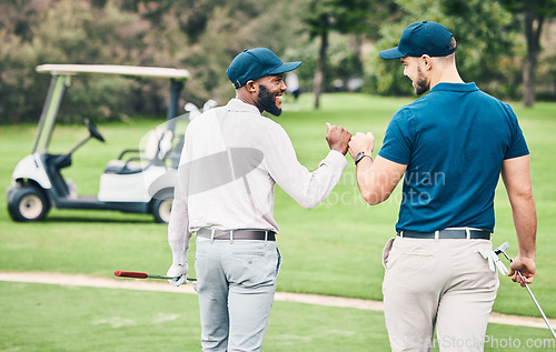 Image of Man, friends and fist bump on golf course for sports, partnership or trust on grass field together. Happy sporty men bumping hands or fists in collaboration for good match, game or competition