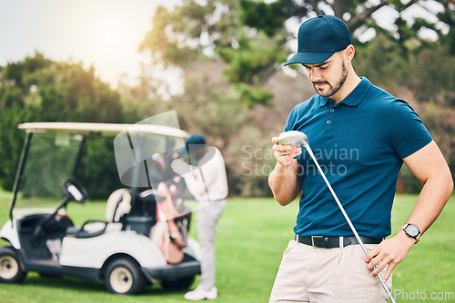 Image of Golf, sports and man on course with golfing club ready to start game, practice and training for competition. Professional golfer, activity and male caddy on grass for exercise, fitness and recreation