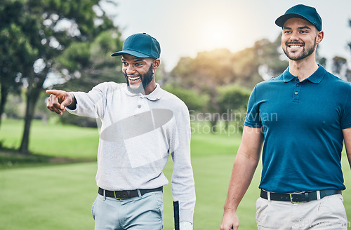 Image of Friends, men on golf course and black man pointing, walking and talking on grass at game. Health, fitness and friendship, happy golfer man and friend with smile walk in nature on weekend together.