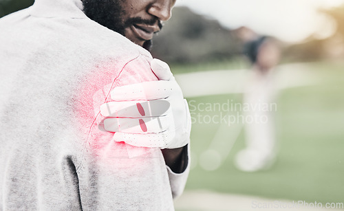 Image of Sports, muscle and golf, black man with shoulder pain during game, massage and relief in health and wellness. Green, hand on injury in support and African golfer with ache at golfing workout on grass