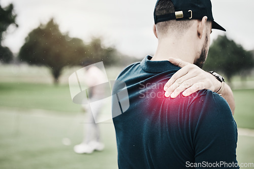 Image of Sports, injury and golf, man with shoulder pain during game on course, massage and relief in health and wellness. Green, hands on muscle for support and golfer with body ache during golfing workout.