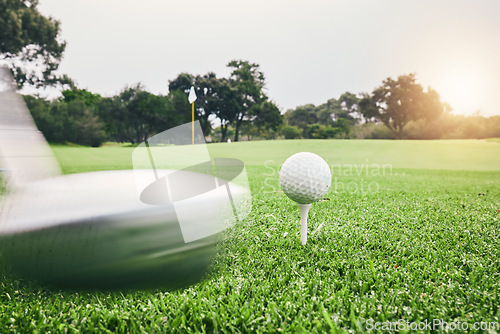 Image of Sports, golf ball and swing with club on course for training, tournament and games. Match, competition and shot with equipment on lawn field and playing for hobby, recreational and leisure in outdoor