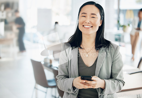 Image of Portrait, success and Asian woman in office, smartphone and typing for social media, happiness and connection. Face, Japanese female employee and manager in workplace, cellphone and communication