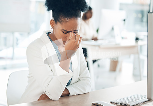 Image of Stress, headache and sad woman on computer with career burnout, anxiety or mental health risk in office. Crying, pain and depression of tired business person with anxiety for mistake, fail or fatigue