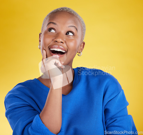 Image of Wow, thinking and aha with a black woman in studio on a yellow background looking thoughtful or surprised. Idea, wonder and eureka with an attractive young female feeling shocked or contemplative