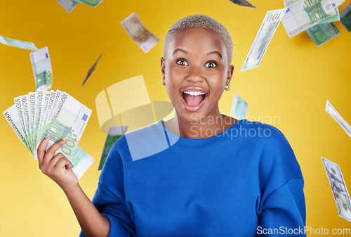 Image of Winner, portrait and excited black woman with euros in studio isolated on a yellow background. Financial freedom, money rain and happy face of wealthy female with cash after winning lottery prize.