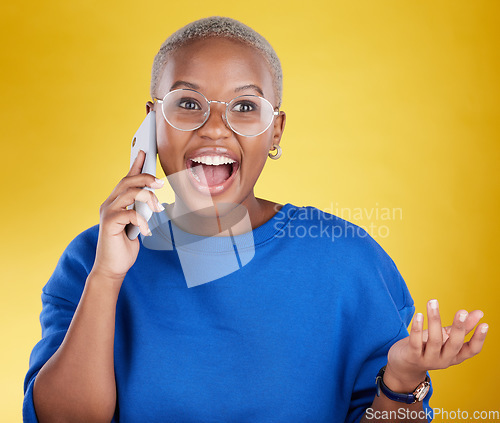 Image of Phone call, talking and laughing black woman in studio isolated on a yellow background. Cellphone, contact and happy African female with mobile smartphone for chatting, funny conversation or speaking