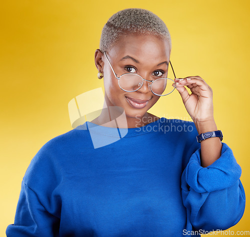 Image of Face, black woman and glasses for vision, fashion and casual outfit against a studio background. Portrait, African American female and lady with spectacles, eyewear and clear sight with confidence