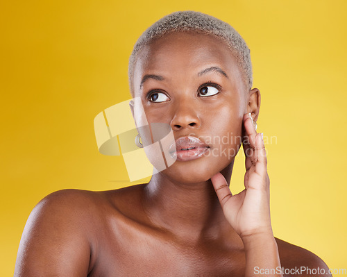 Image of Beauty, skincare and serious with black woman in studio for cosmetics, satisfaction and self care. Glow, dermatology and confidence with female model on yellow background for natural and treatment