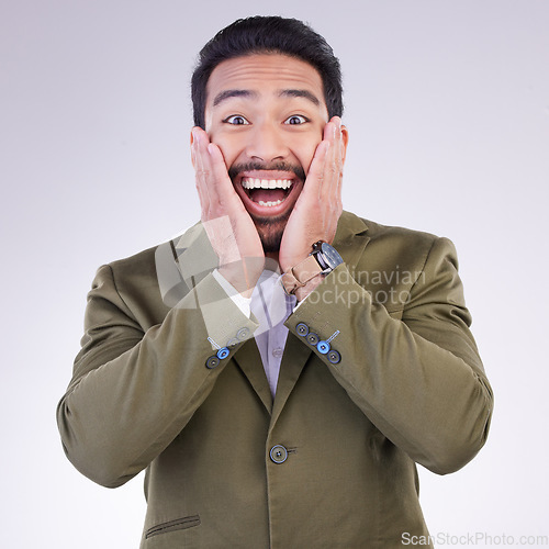 Image of Happy, surprise and portrait of a businessman in a studio with wow, omg or wtf face expression. Happiness, excited and corporate male model from India with a shock facial gesture by a gray background