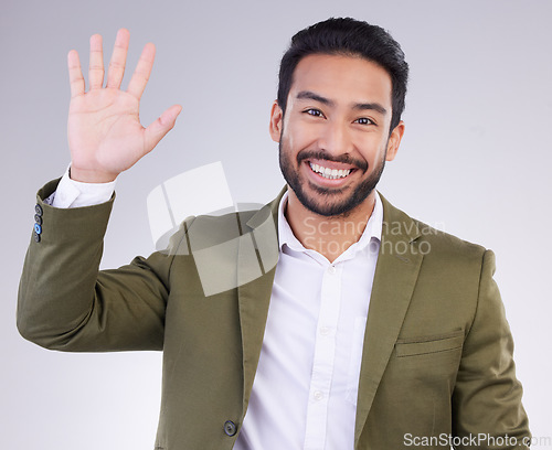 Image of Portrait, greeting and Asian man with success, wave and guy against grey studio background. Face, Japanese male and entrepreneur with smile, opportunity and hello with employee, happiness and welcome