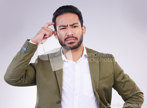 Image of Confused, decision and an Asian man thinking with a gesture isolated on a white background in a studio. Doubt, think and a Japanese businessman with a choice, pensive and thoughtful on a backdrop