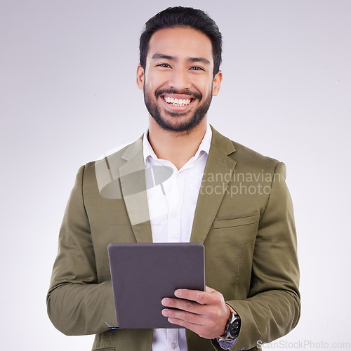Image of Business man, tablet and smile portrait in studio for internet, communication and network connection. Entrepreneur male online for mobile app networking, marketing or research on investment or sales