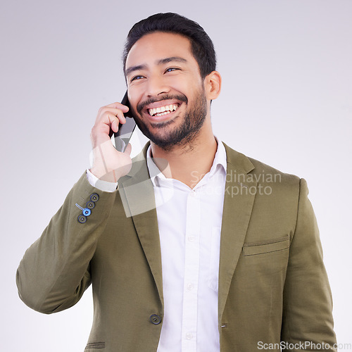 Image of Business man, smile and phone call in studio for communication and networking on gray background. Asian male entrepreneur with smartphone for conversation or talking to contact for happy negotiation