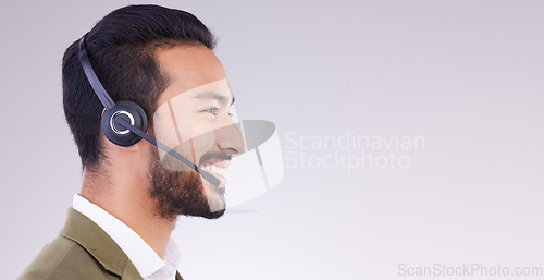 Image of Call center, man and face profile with smile, headset and mic, CRM and contact us with mockup space. Communication, customer service or tech support, telemarketing and happy male on studio background