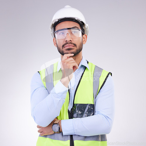 Image of Construction worker thinking, serious man with ideas and architect or engineer in building industry on studio background. Male contractor, mockup and professional builder with helmet and goggles