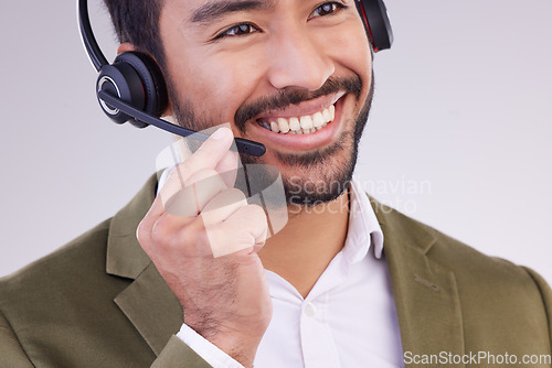 Image of Call center headset of happy man isolated on a white background telemarketing, telecom or global support. Asian international agent, virtual consultant or business salesman or person talk in studio