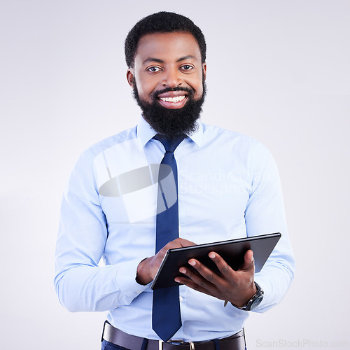 Image of Portrait, tablet and black man isolated on a gray background for stock market, trading and business financial software. Professional worker, person or entrepreneur on digital technology app in studio