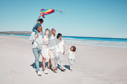 Image of Relax, holding hands and kite with big family on beach for vacation, summer break and playful. Bonding, support and grandparents with children and parents for holiday, affectionate and generations