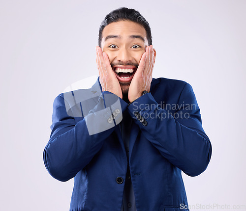 Image of Surprise, excited and portrait of man in studio with omg, happiness and good news on white background. Winner, wow mockup and isolated happy male with hands on face for winning, smile and success