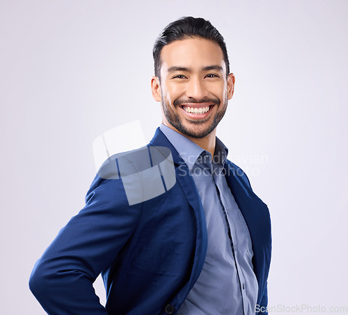 Image of Happy, smile and portrait of a businessman in studio with a confident, proud and positive mindset. Happiness, excited and professional male employee from India standing with pride by gray background.