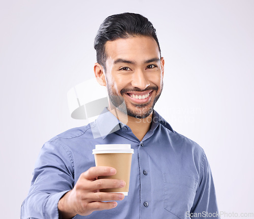 Image of Business man, coffee cup toast and portrait in studio with smile, motivation and start morning by background. Happy asian businessman, takeaway latte and cheers for success, giving and offer at job