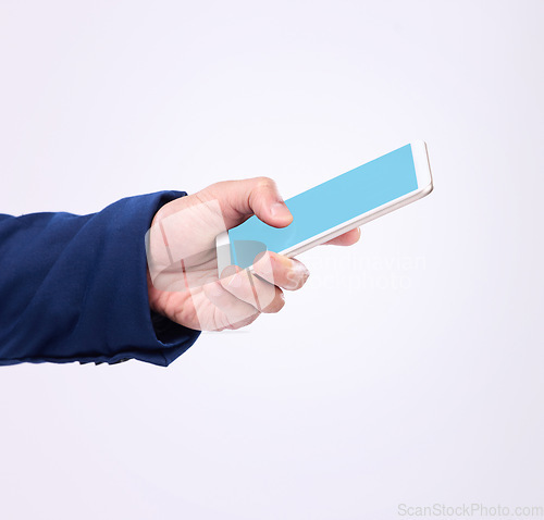 Image of Man, hand and phone with green screen in studio for communication or network connection on website. Hands of male with smartphone for internet search, mobile app or mockup chat on a white background