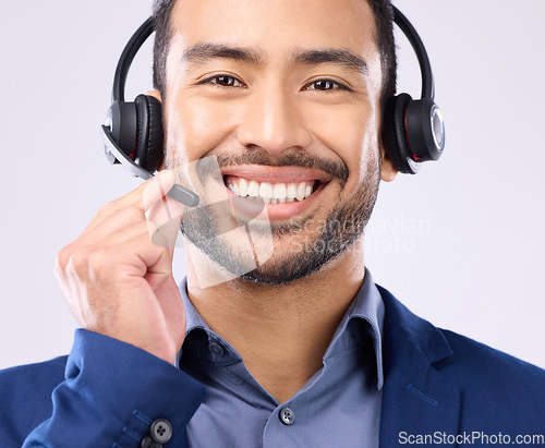 Image of Call center portrait of happy man isolated on a white background in headset for telecom or global support. Face of international agent, consultant or salesman business person virtual career in studio