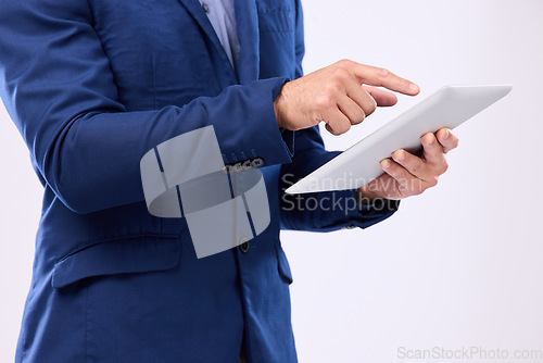 Image of Business man, tablet in hands and in studio for communication with network connection on social media. Hand of male typing internet search, mobile app and online contact chat on isolated background