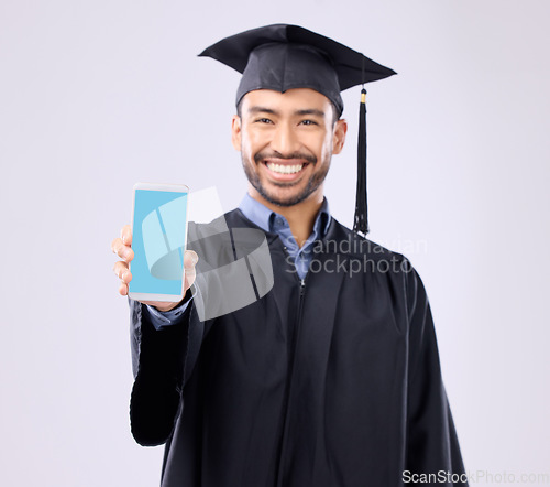 Image of Phone, green screen and graduation student portrait isolated on white background on cellphone mockup for university. Asian man or mobile app, elearning platform or success promotion in studio