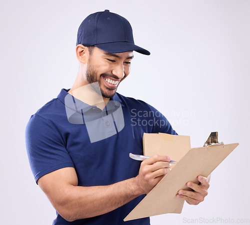 Image of Delivery man writing on checklist isolated on studio background in courier service, supply chain and clipboard. Asian worker, business or logistics person package in Korea distribution management